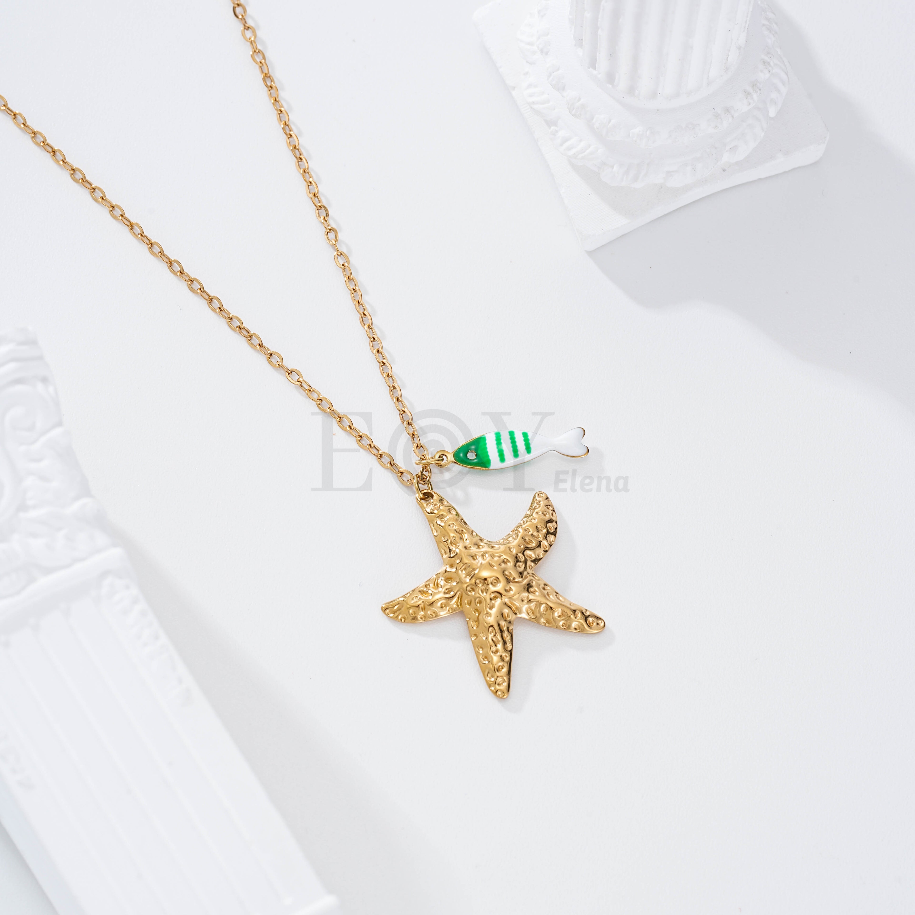 Collar pez rayas y estrella dorada