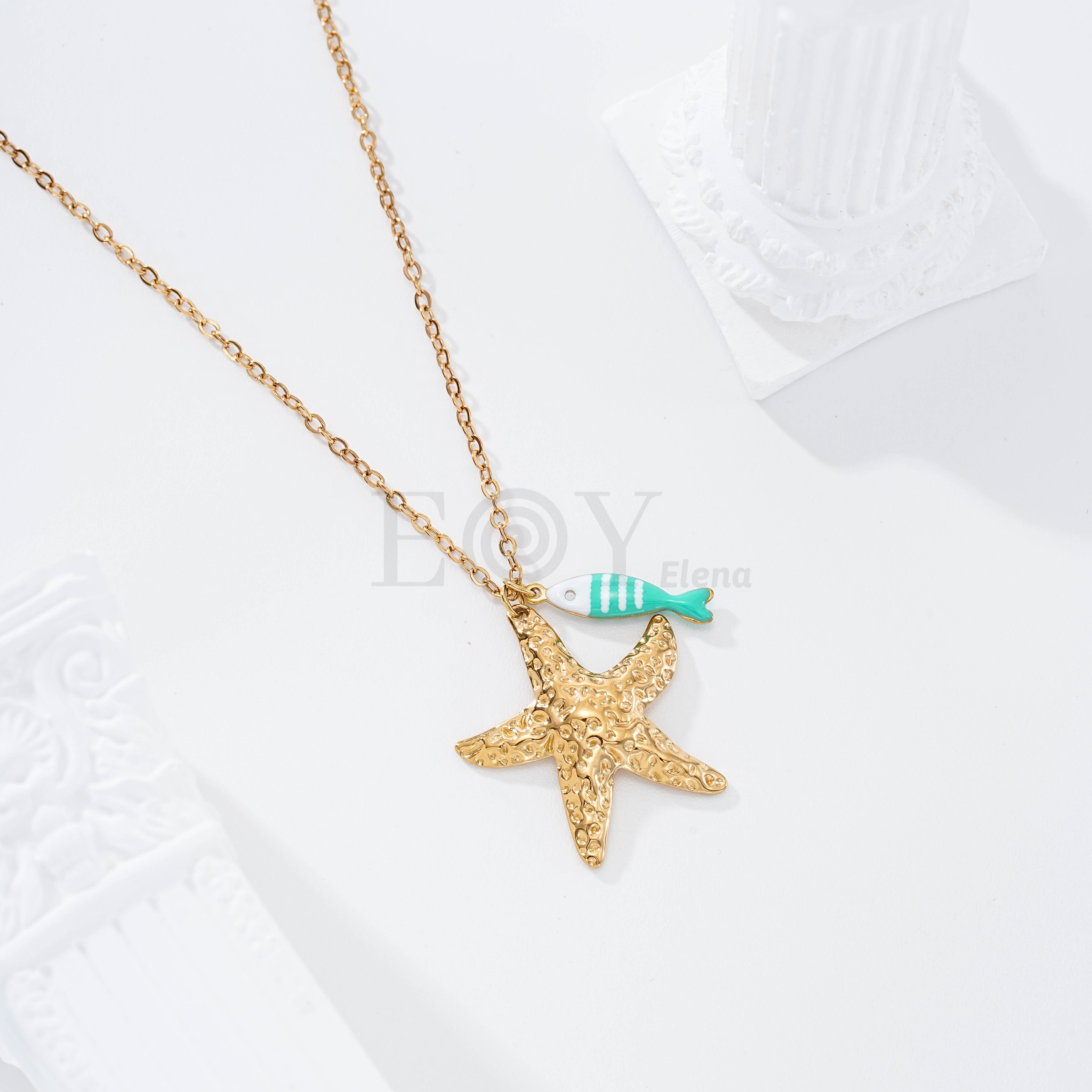 Collar pez rayas y estrella dorada