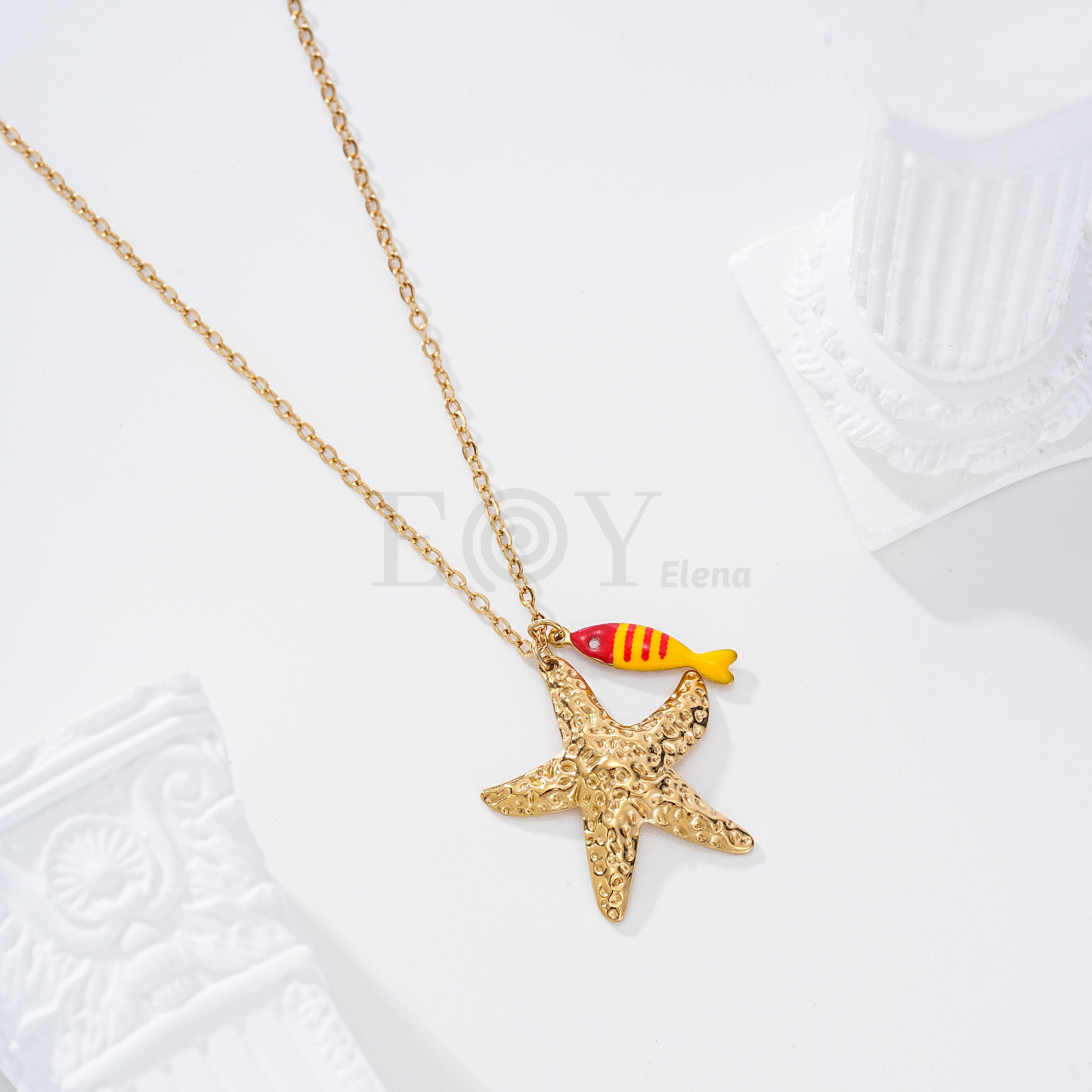 Collar pez rayas y estrella dorada