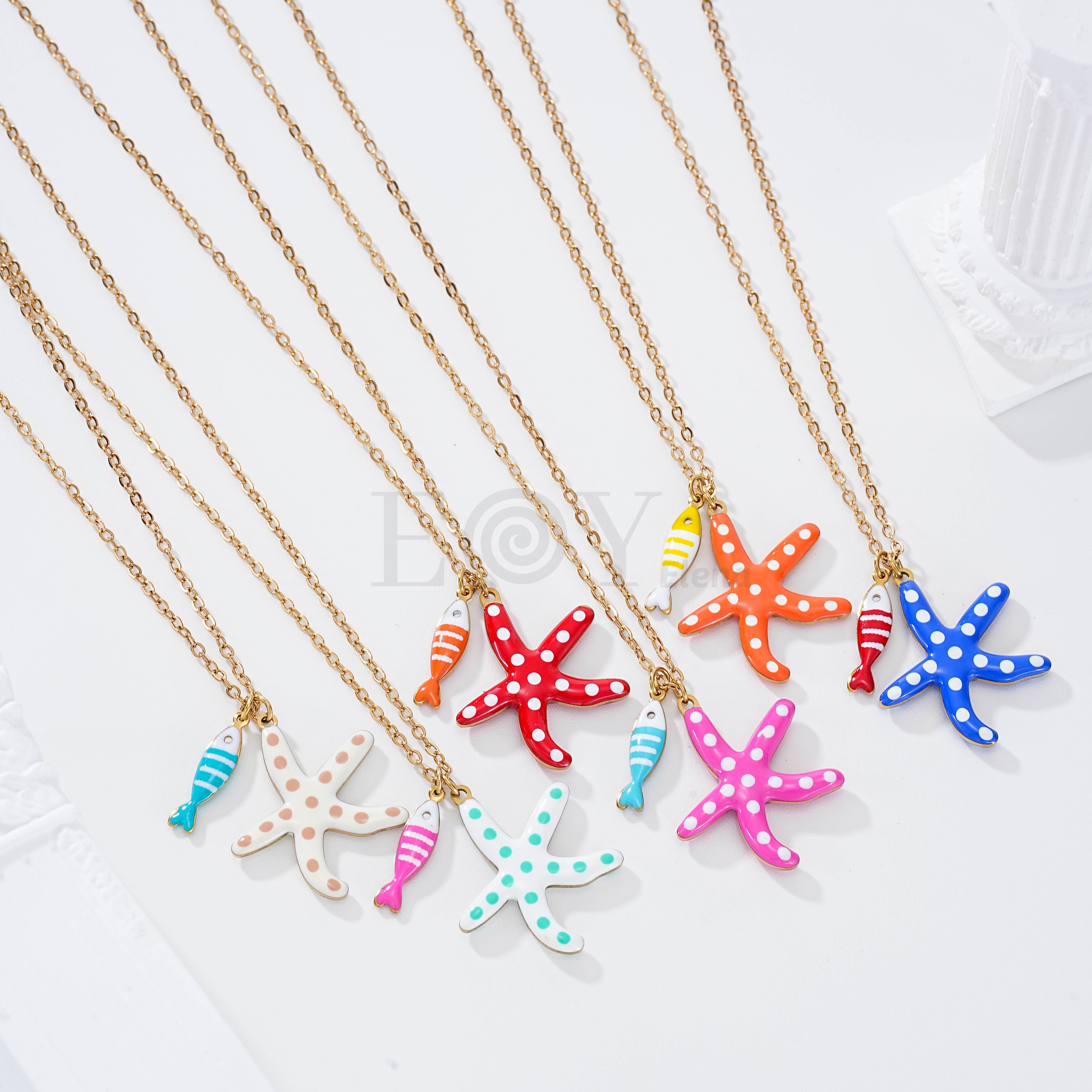 Collar estrella de mar lunares y pez raya color