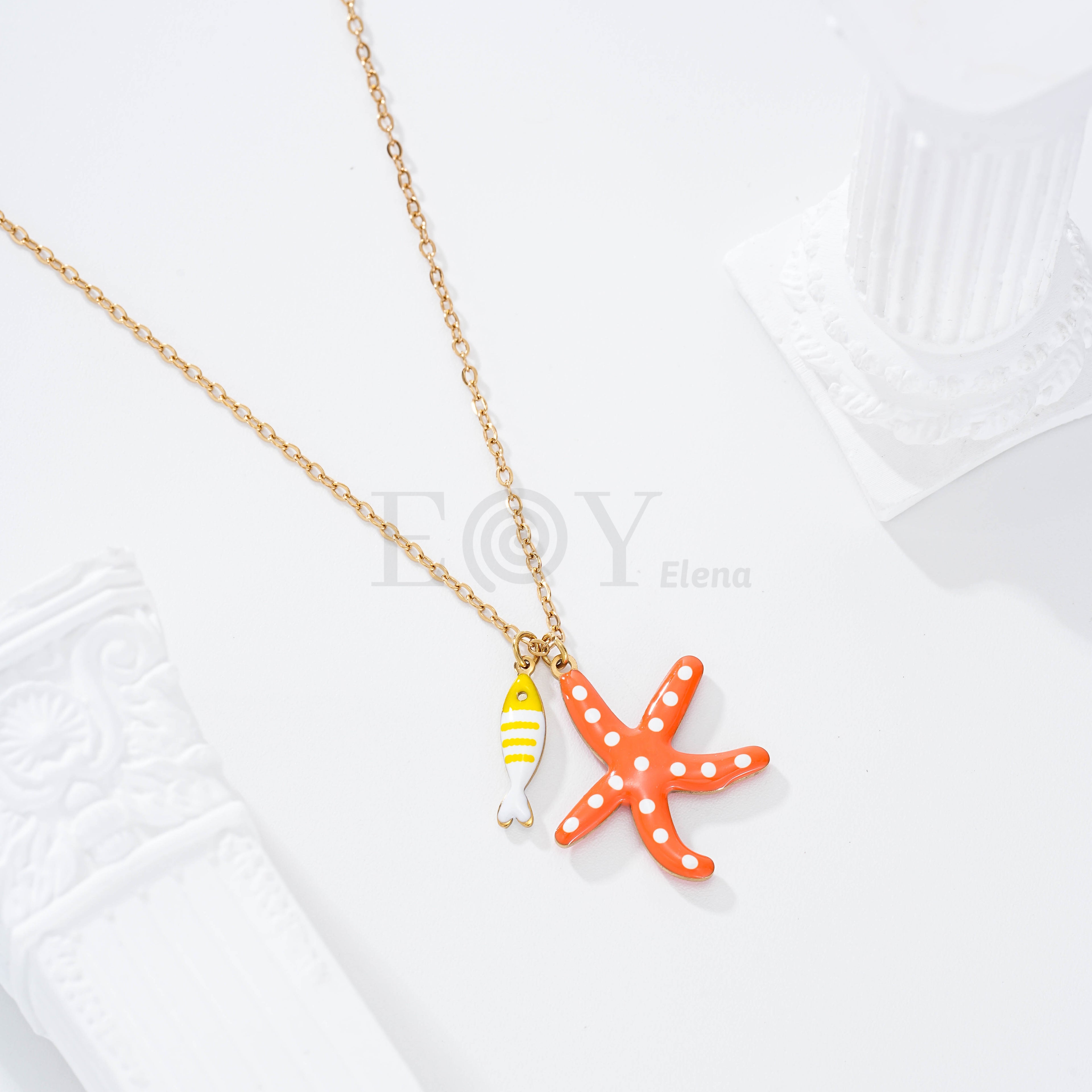 Collar estrella de mar lunares y pez raya color