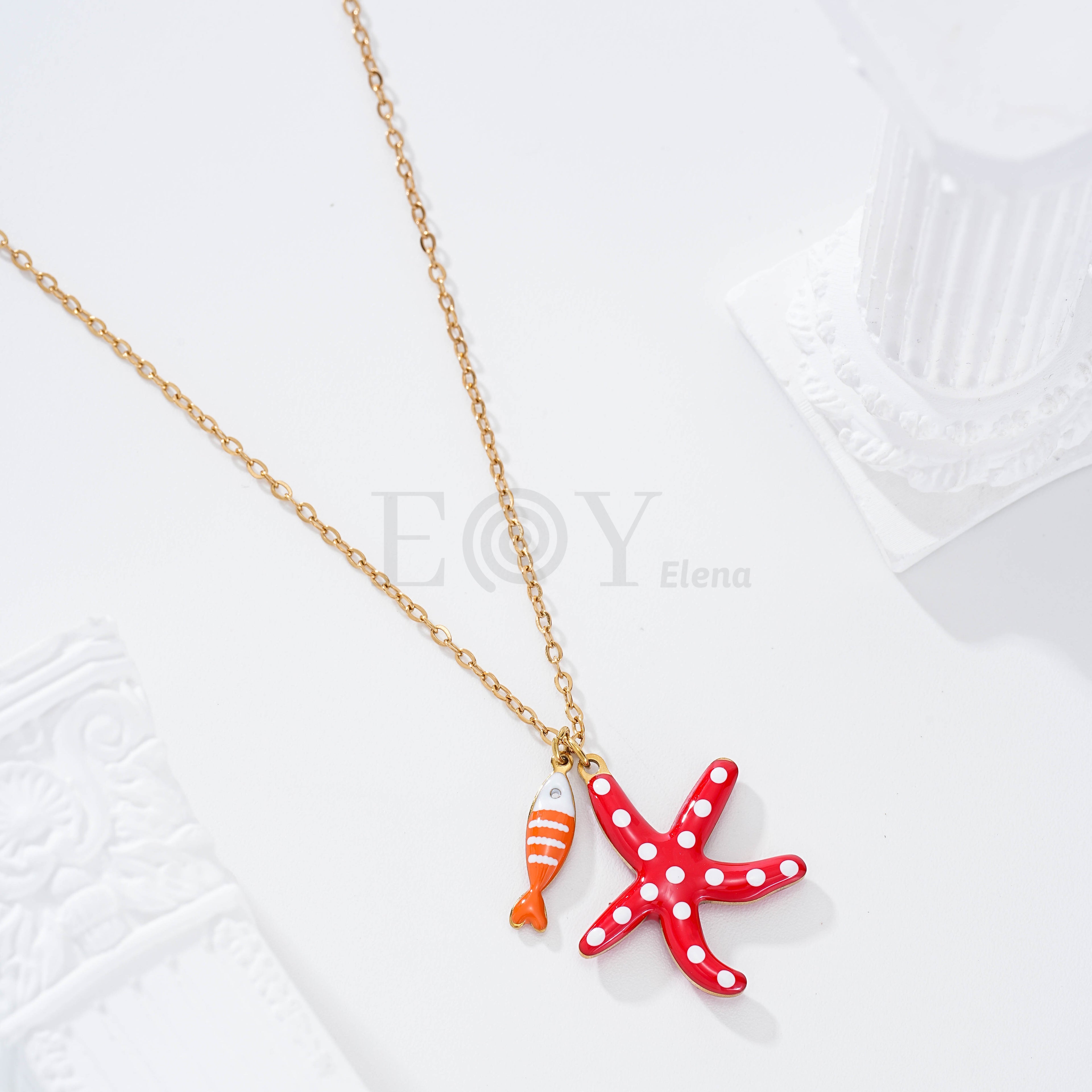 Collar estrella de mar lunares y pez raya color