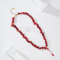 Collar piedras rojas con pez rayas