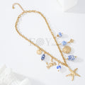 Collar estrella con charms marinos y blancos