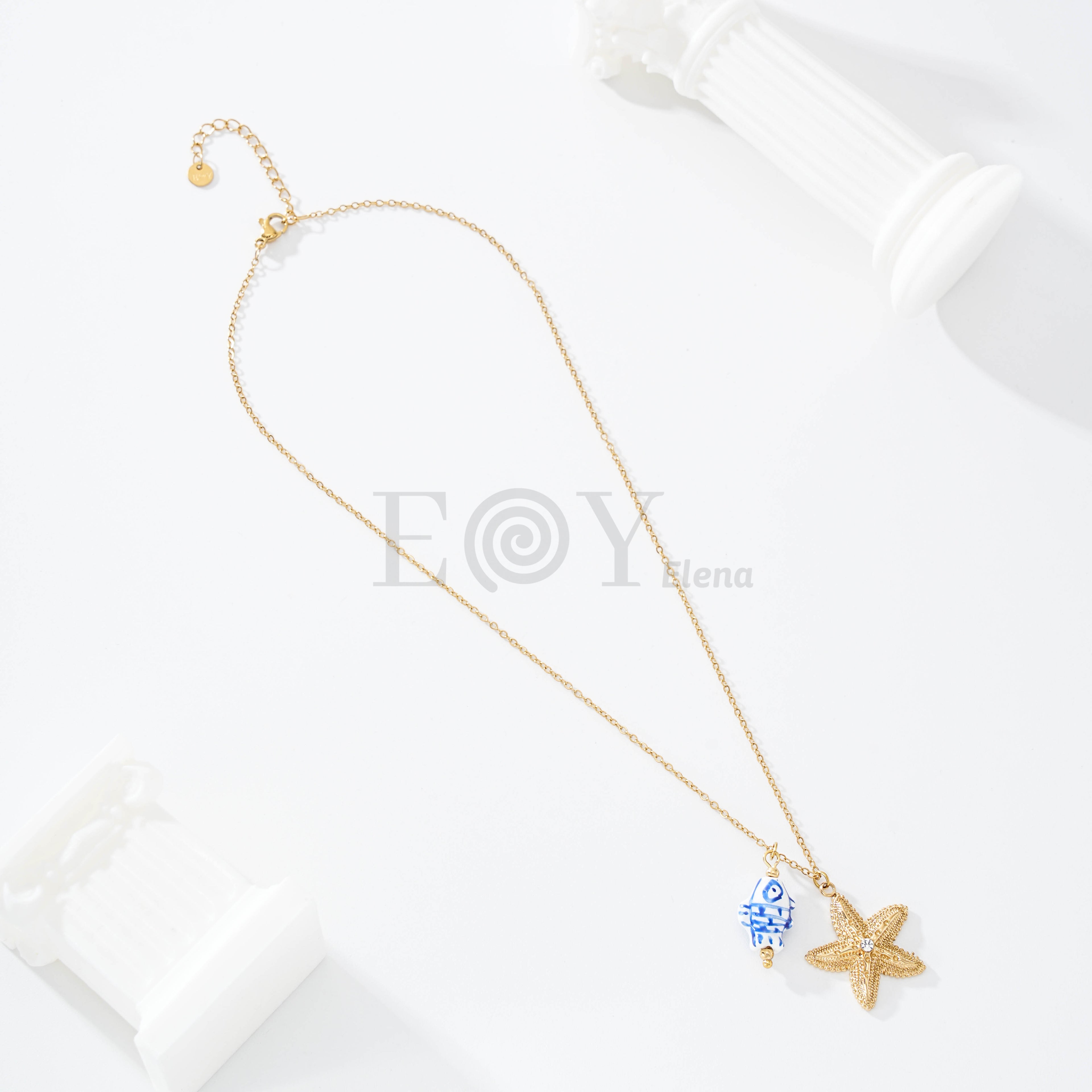 Collar estrella de mar y pez charm
