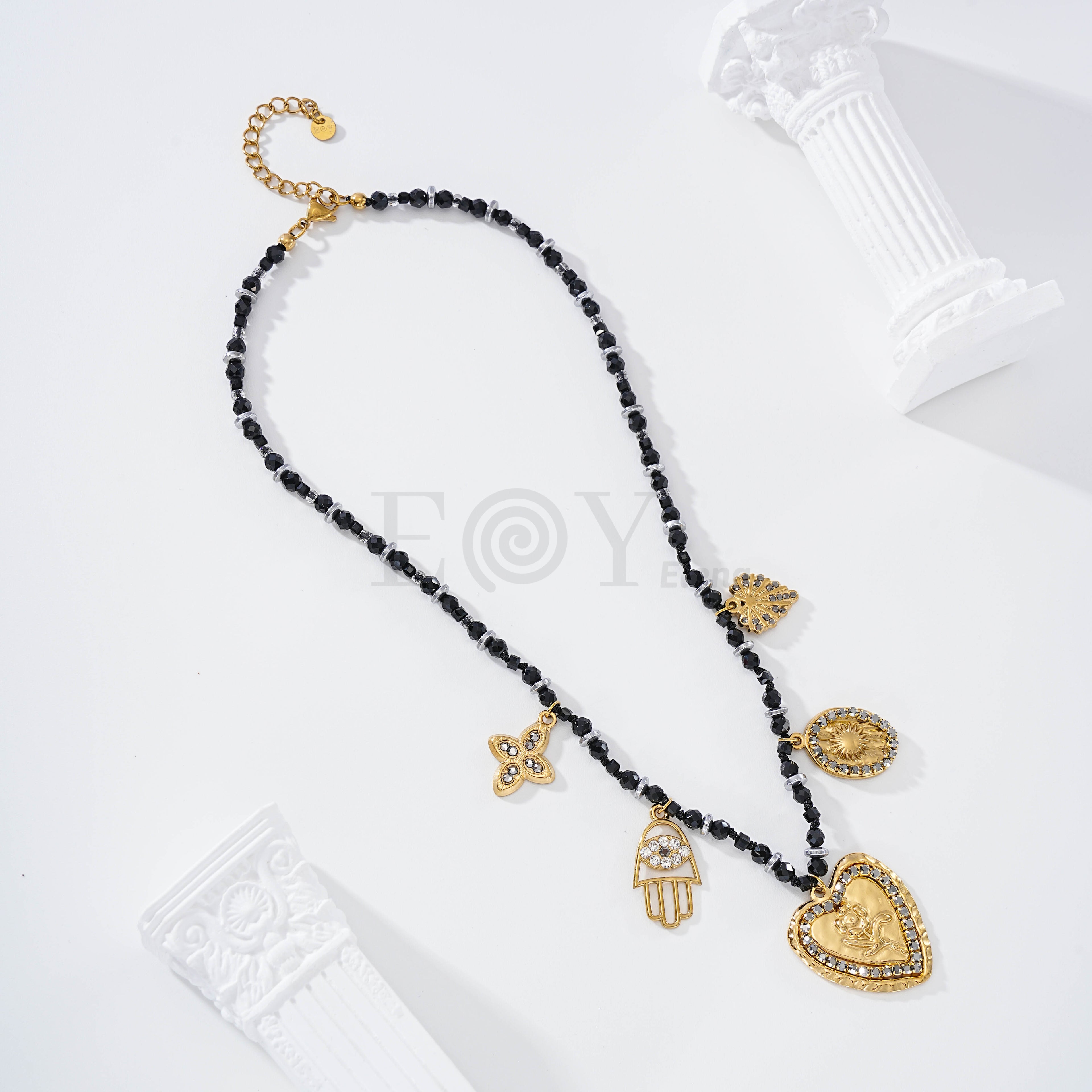 Collar cadena piedras negras y charms