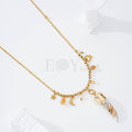 Collar colmillo y charms pequeños
