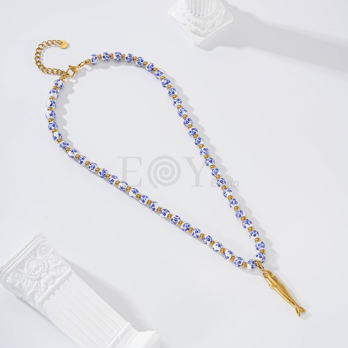Collar bolas cerámica con pez alargado acero
