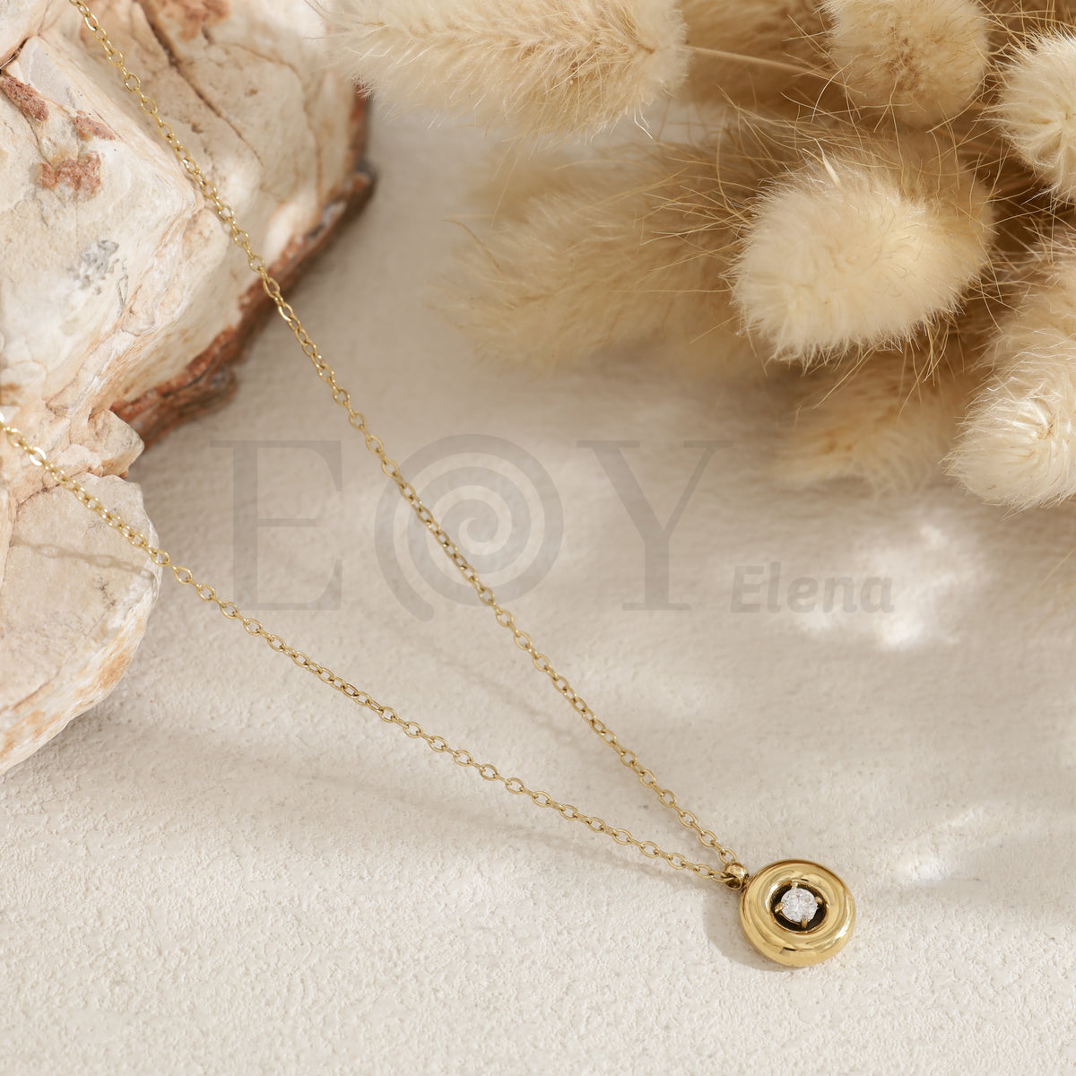 Collar con circonita central acero