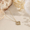 Collar doble corazón circonitas cruzado