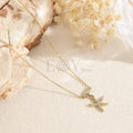 Collar barra circonitas y estrella mar acero