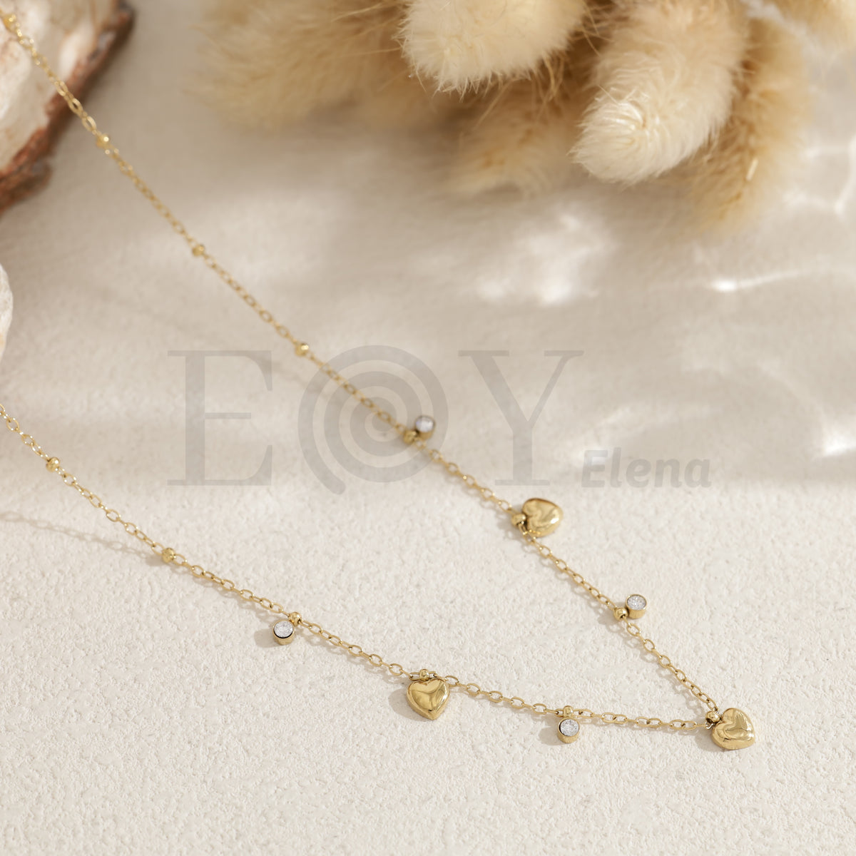 Collar corazones con circonitas acero