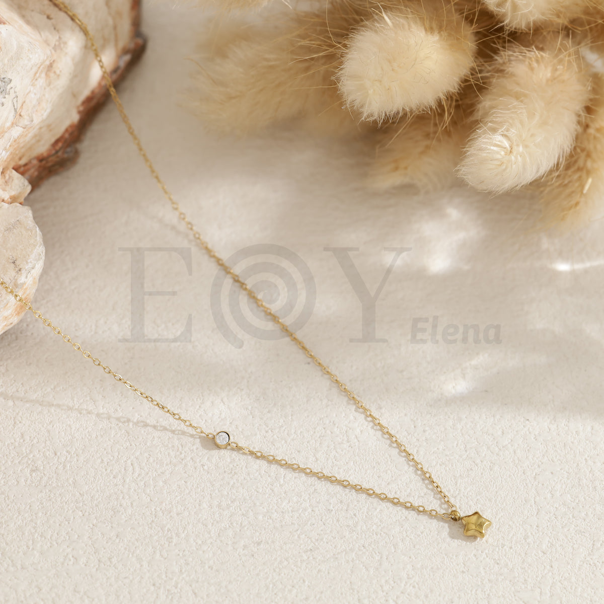 Collar estrella con circonita acero