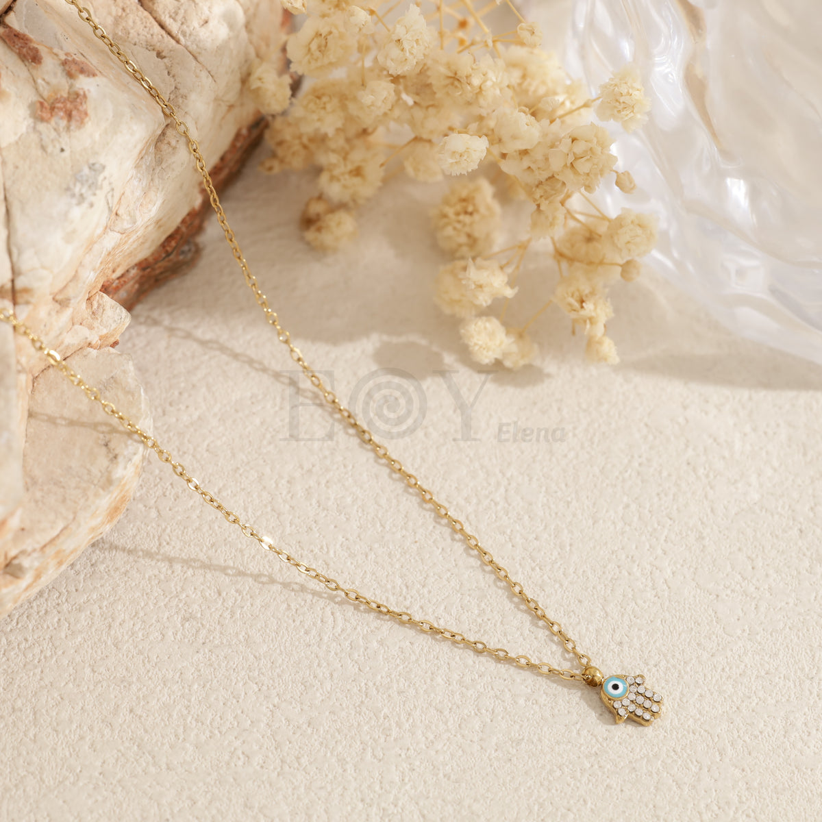 Collar mano de Fátima con ojo turco acero