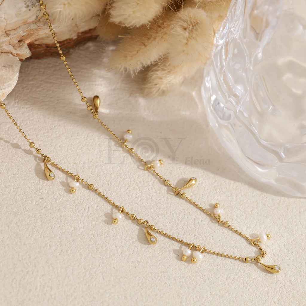 Collar chapas con perlas acero