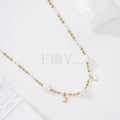 Collar bolitas con perlas, estrella y luna acero