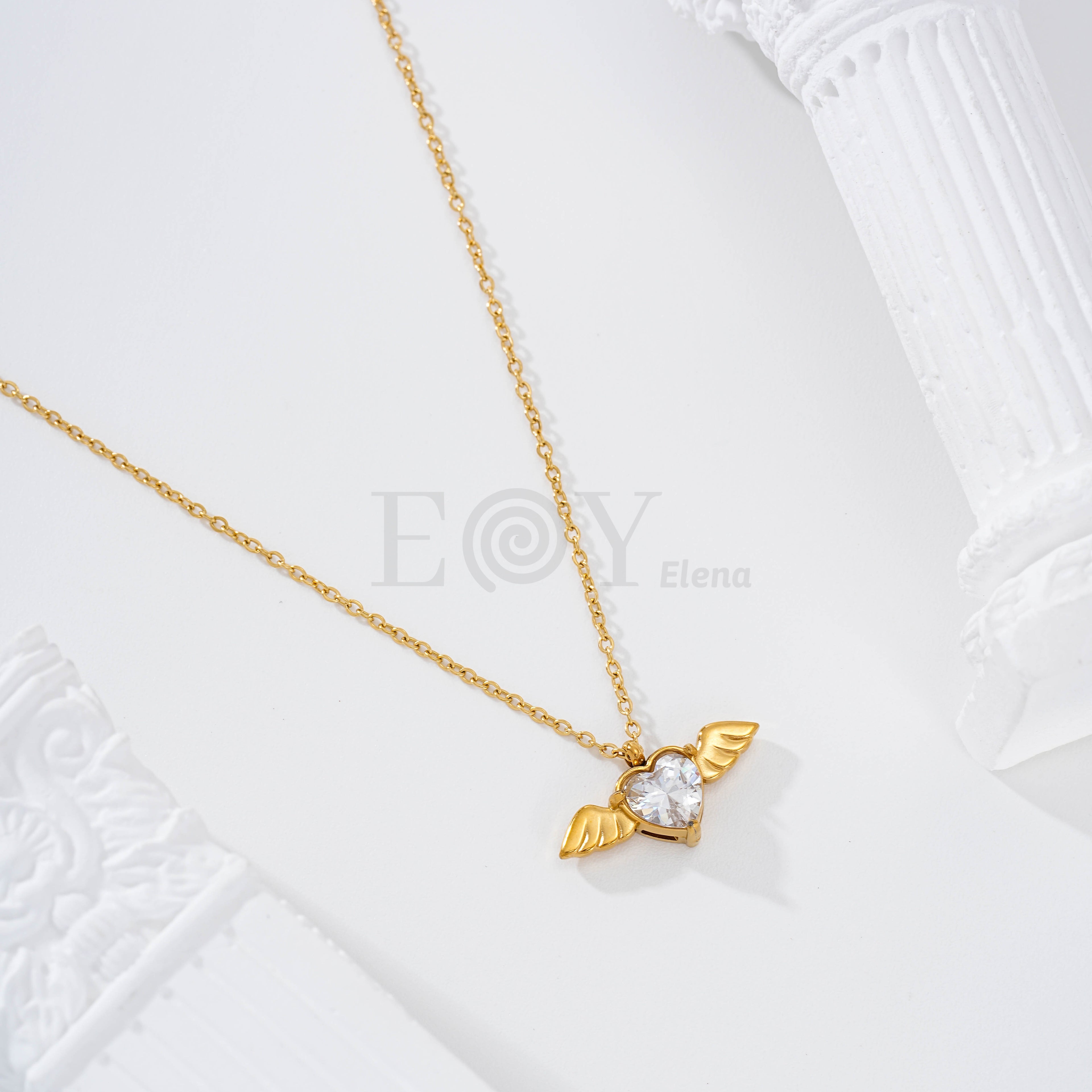Collar corazón circonita con alas acero