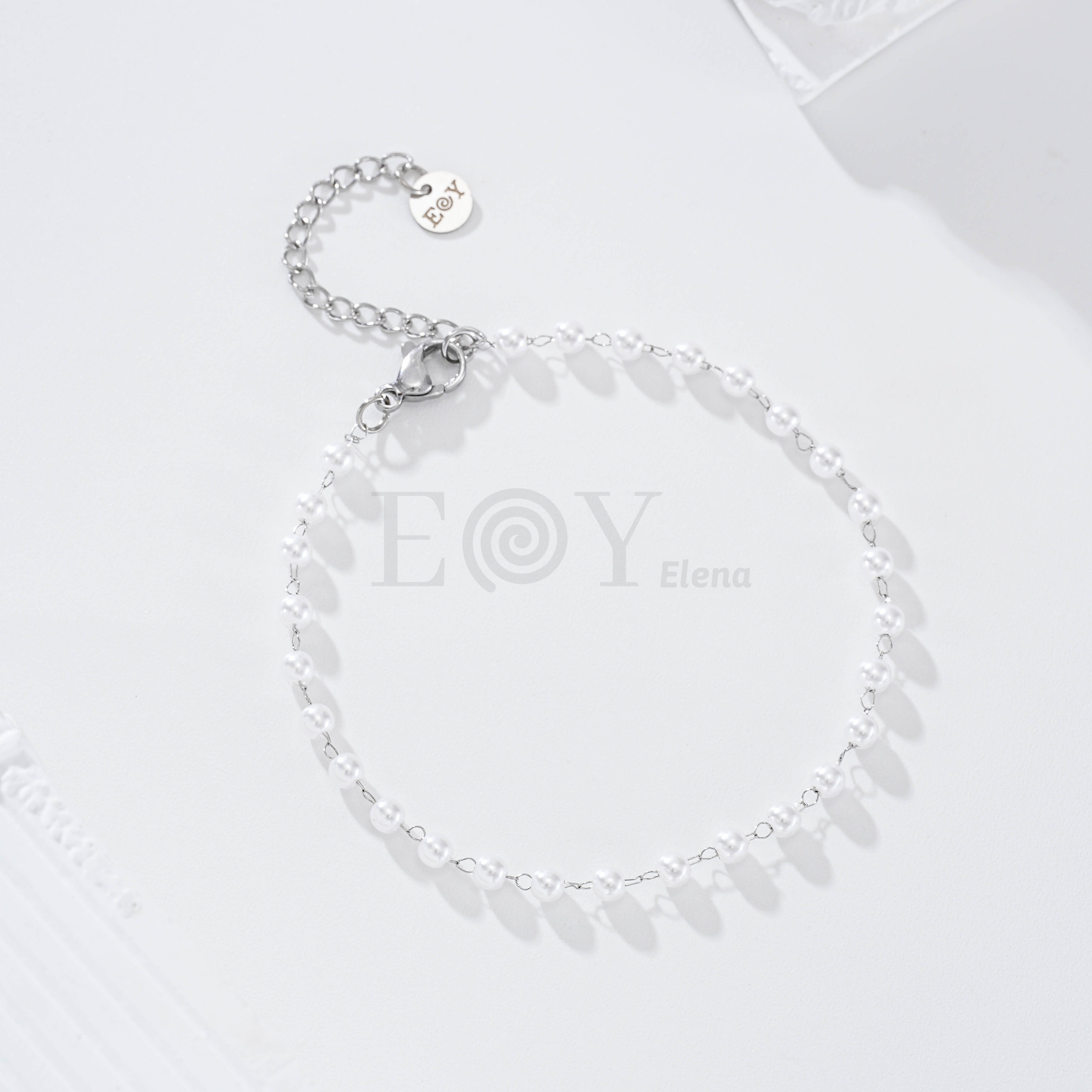 Pulsera perlas cadena acero