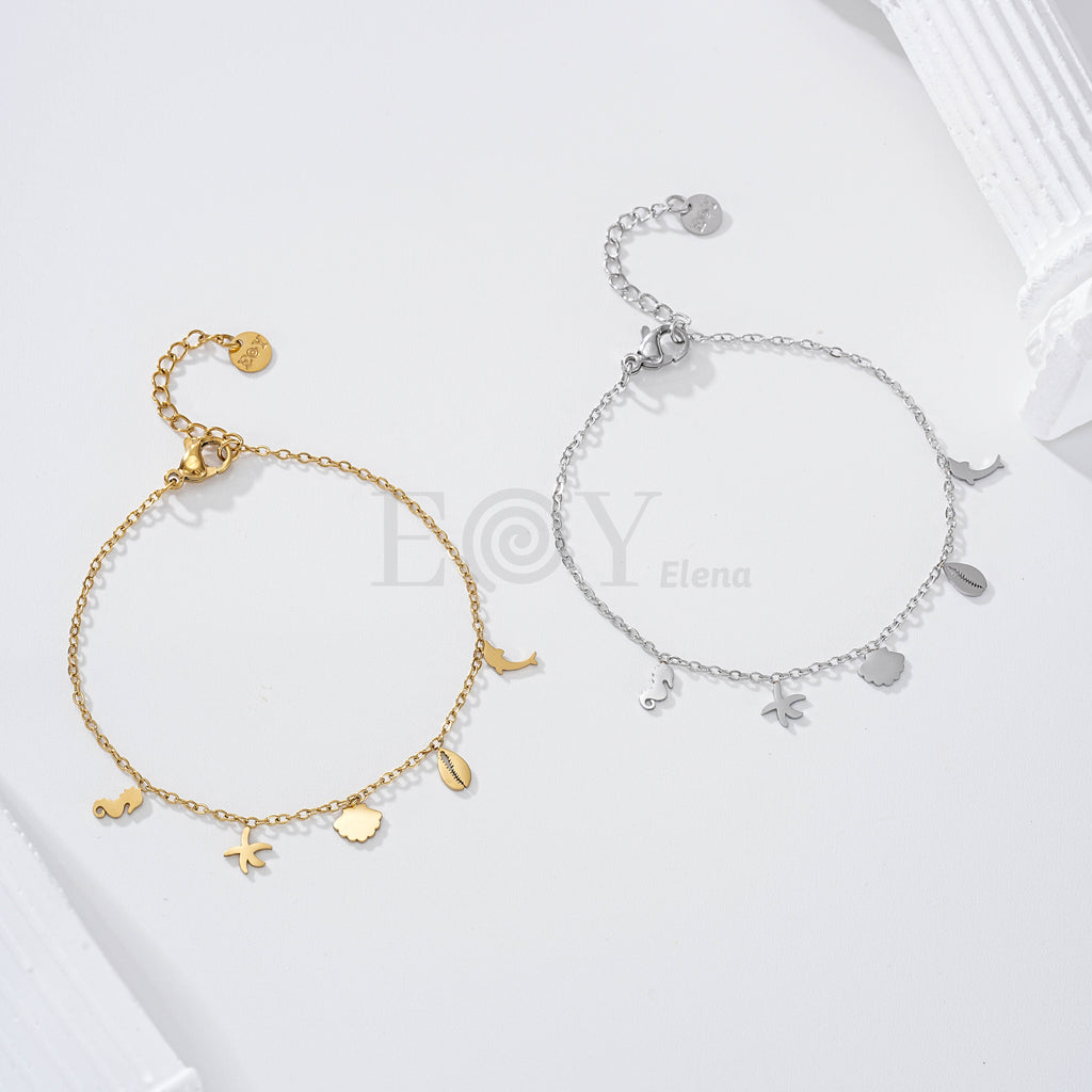Pulsera con charms planos marinos acero