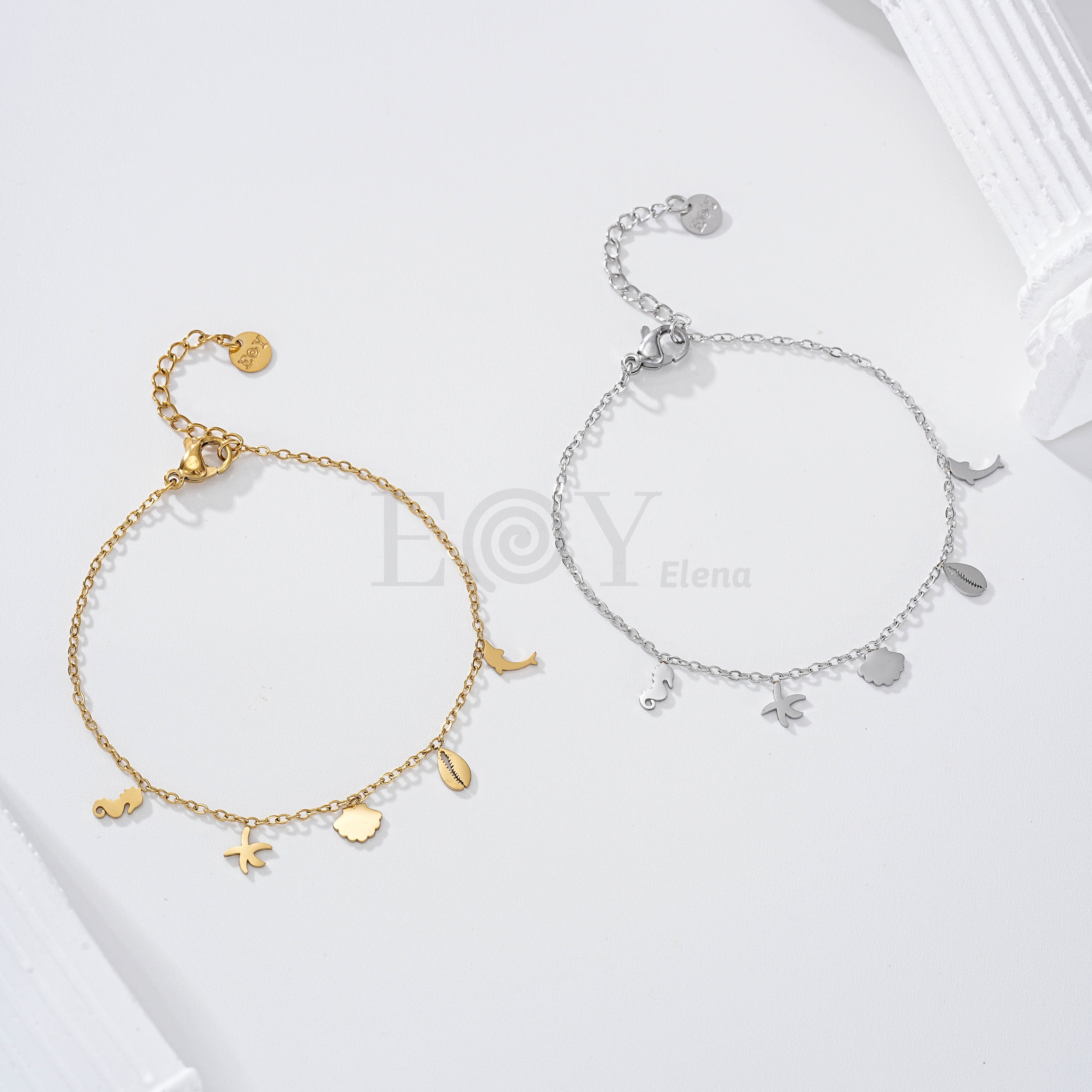 Pulsera con charms planos marinos acero