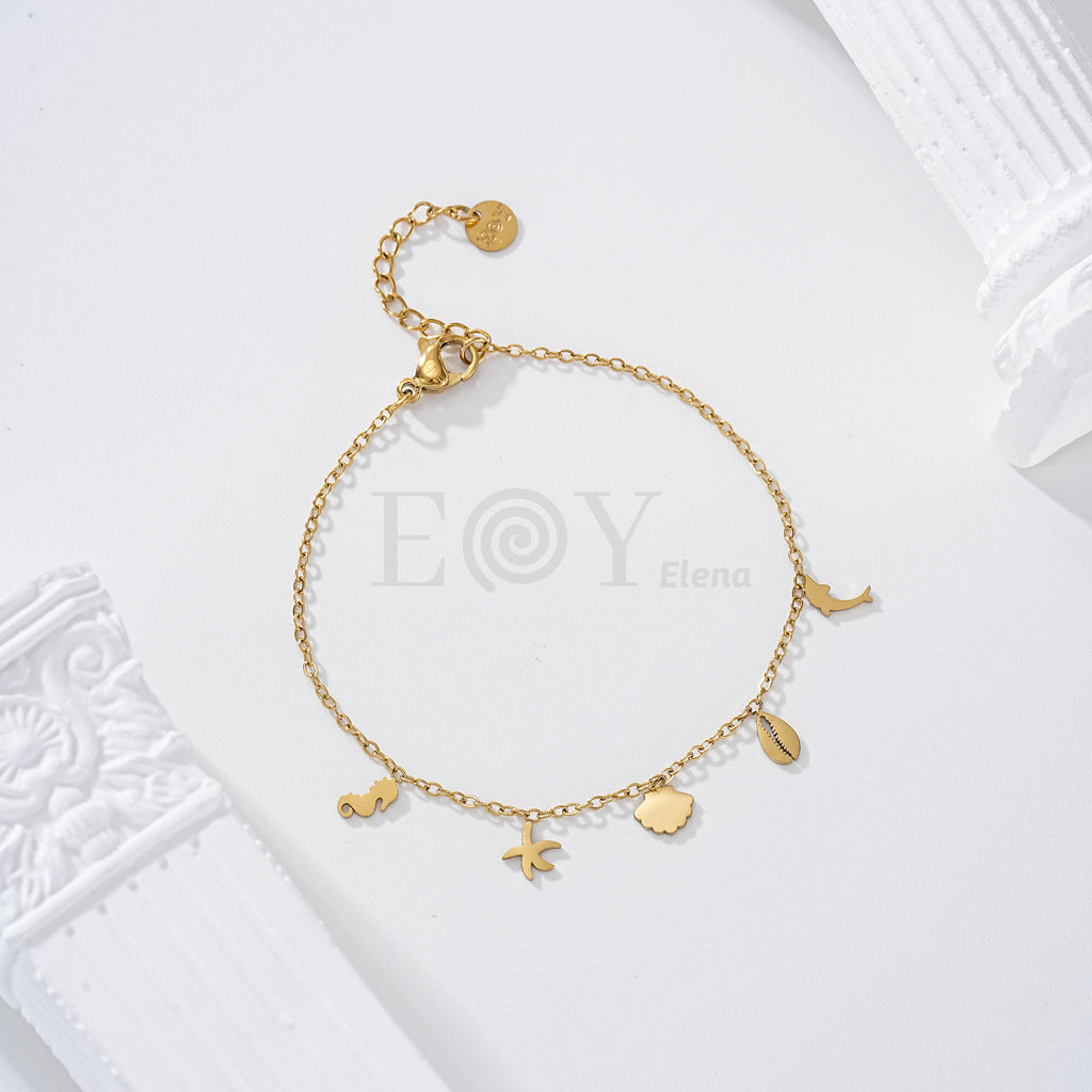 Pulsera con charms planos marinos acero