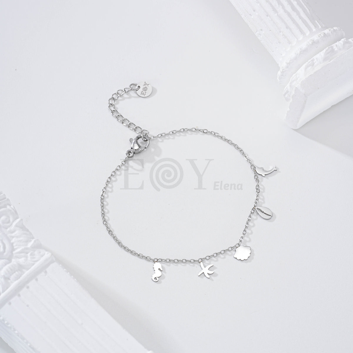 Pulsera con charms planos marinos acero