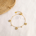 Pulsera de conchas y circonitas
