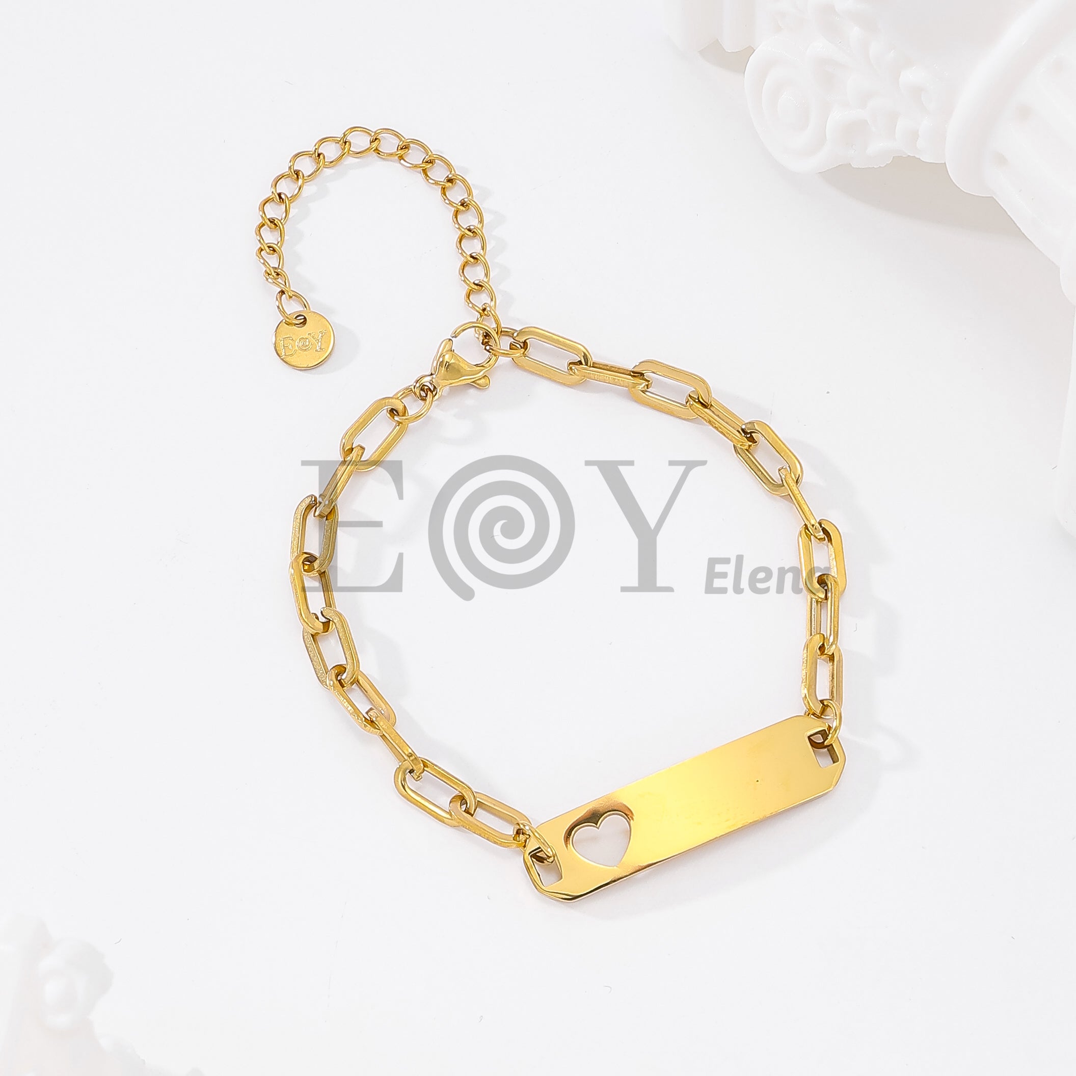 Pulsera con chapa y corazón