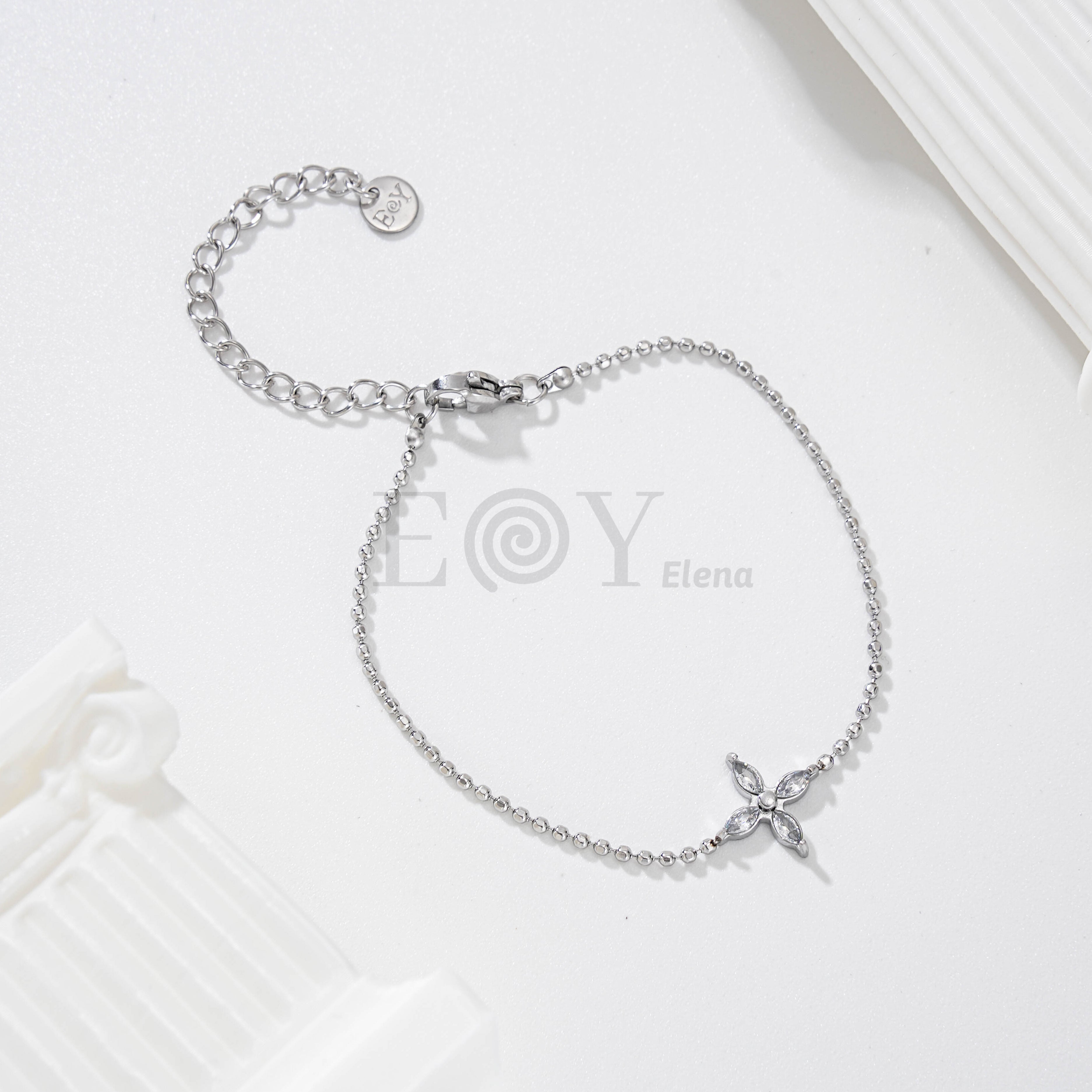 Pulsera de bolas con flor de circonitas