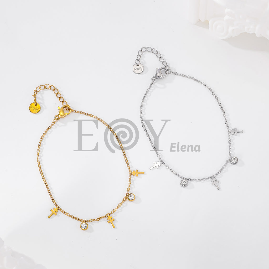 Pulsera de cadena con cruces colgantes y circonitas