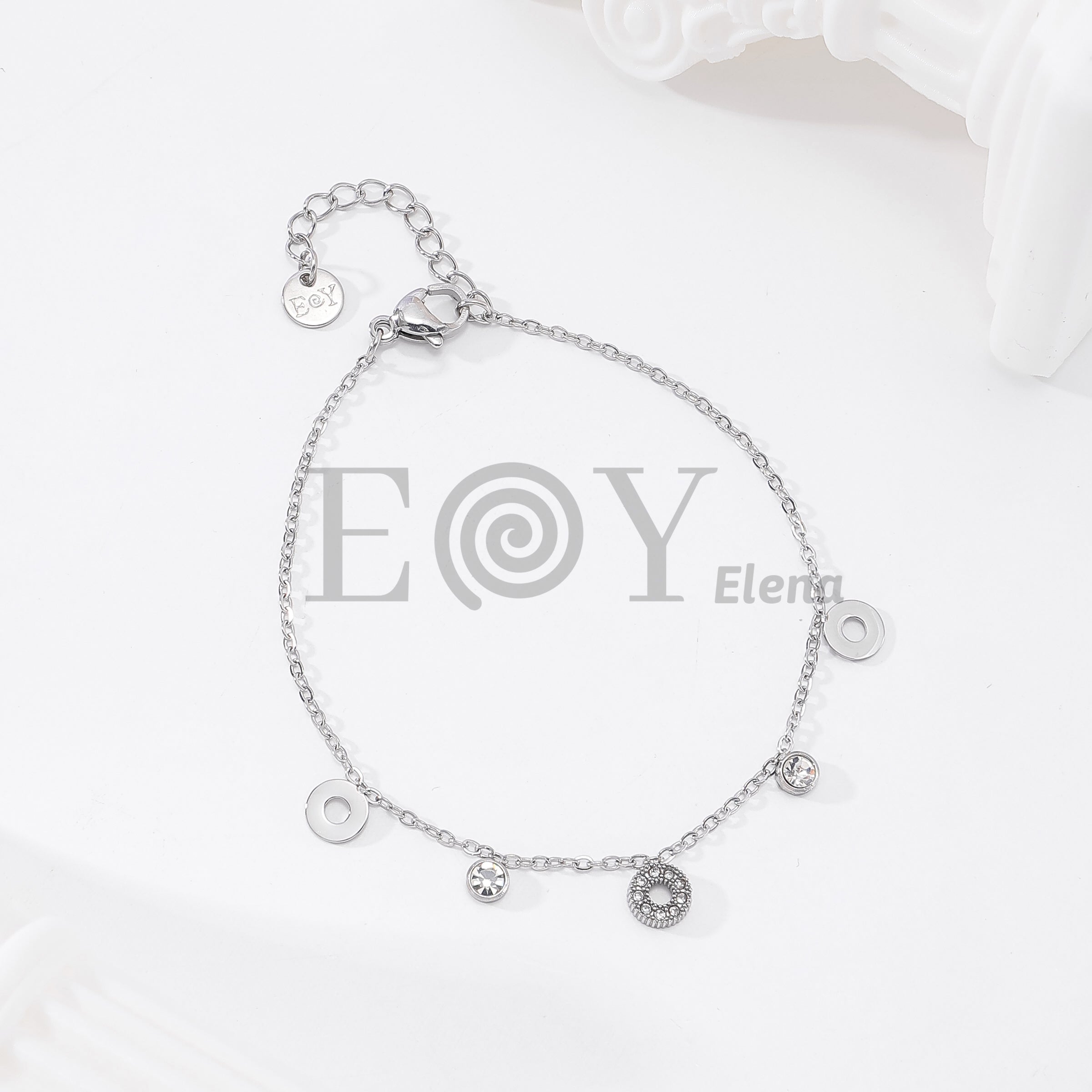 Pulseras aros y circonitas