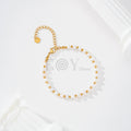 Pulsera de perlas y bolas