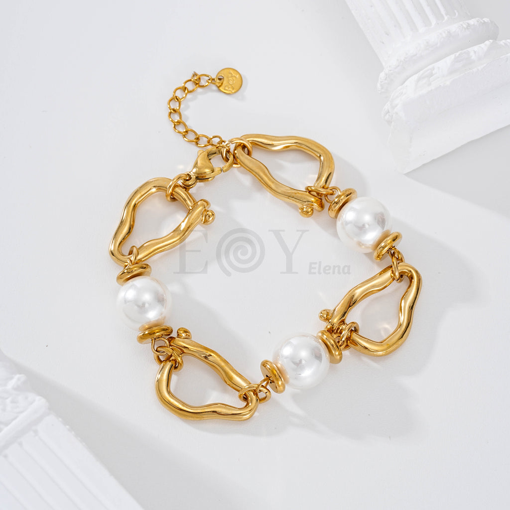 Pulsera aro con forma y perlas
