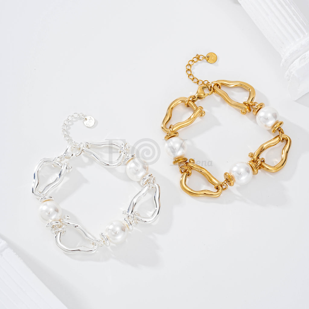 Pulsera aro con forma y perlas