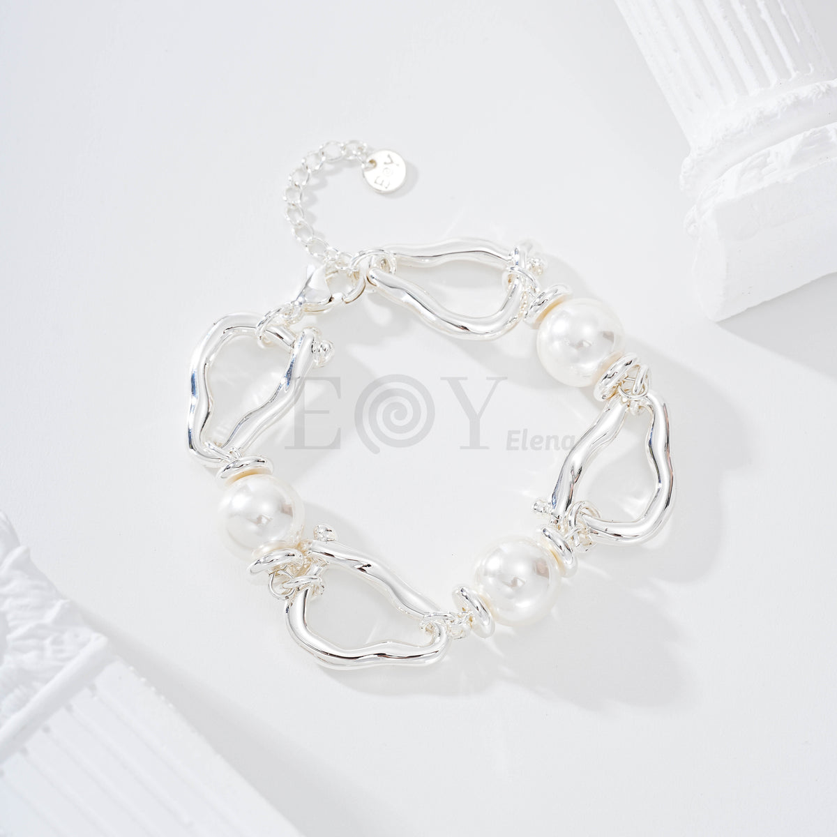 Pulsera aro con forma y perlas
