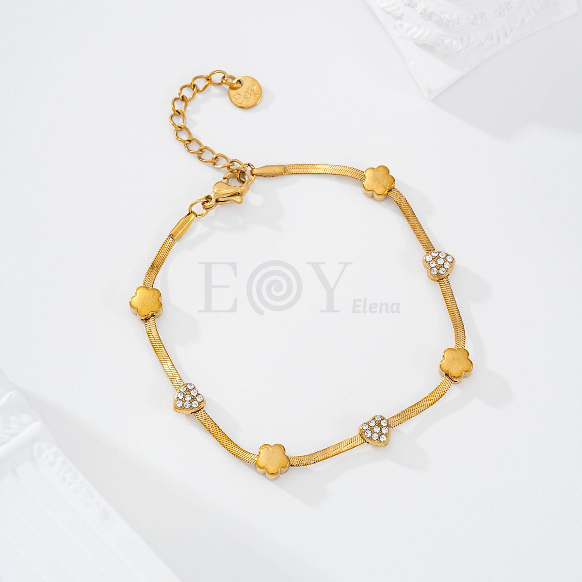 Pulsera cadena plana con chapa flor y circonitas acero