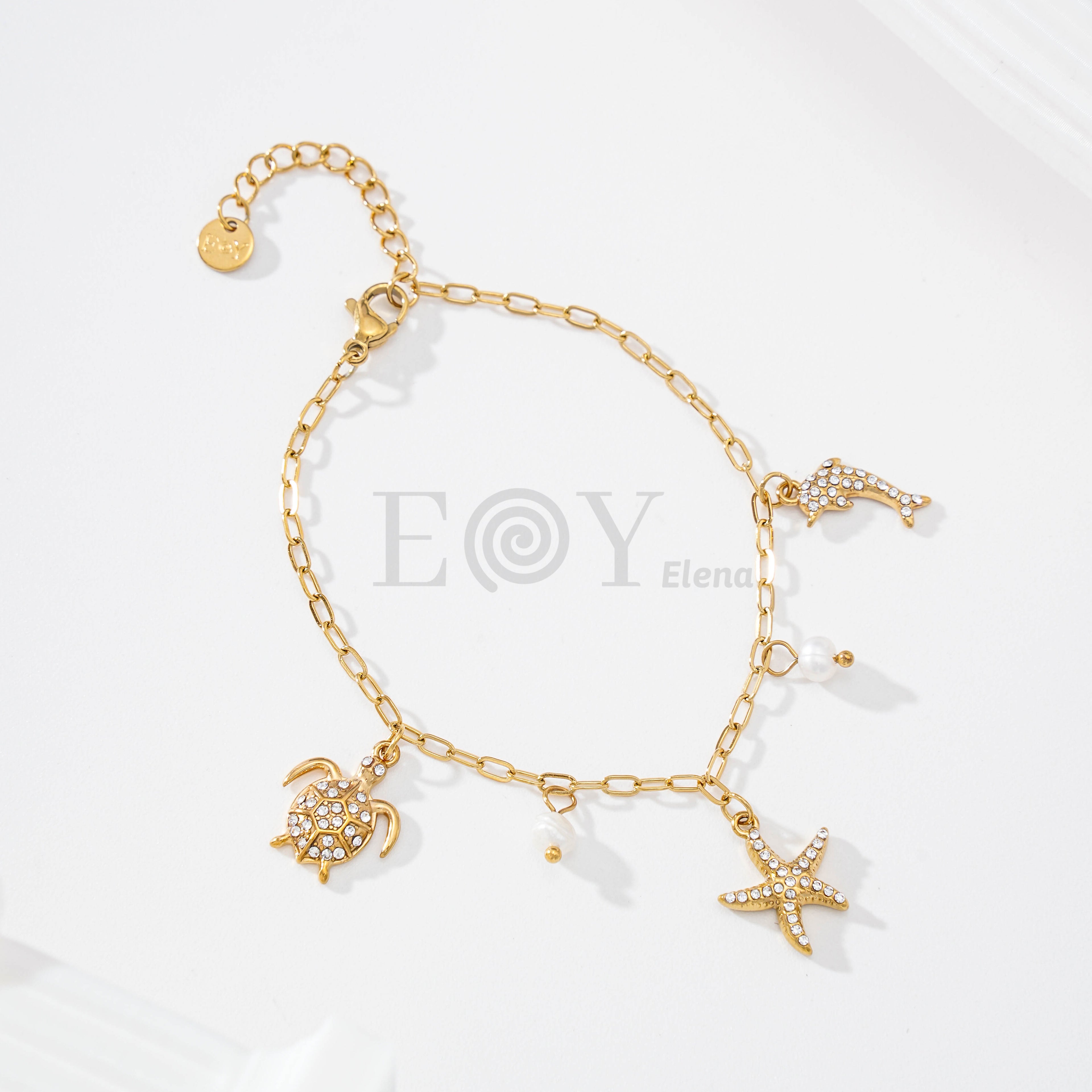 Pulsera con charms marinos circonitas