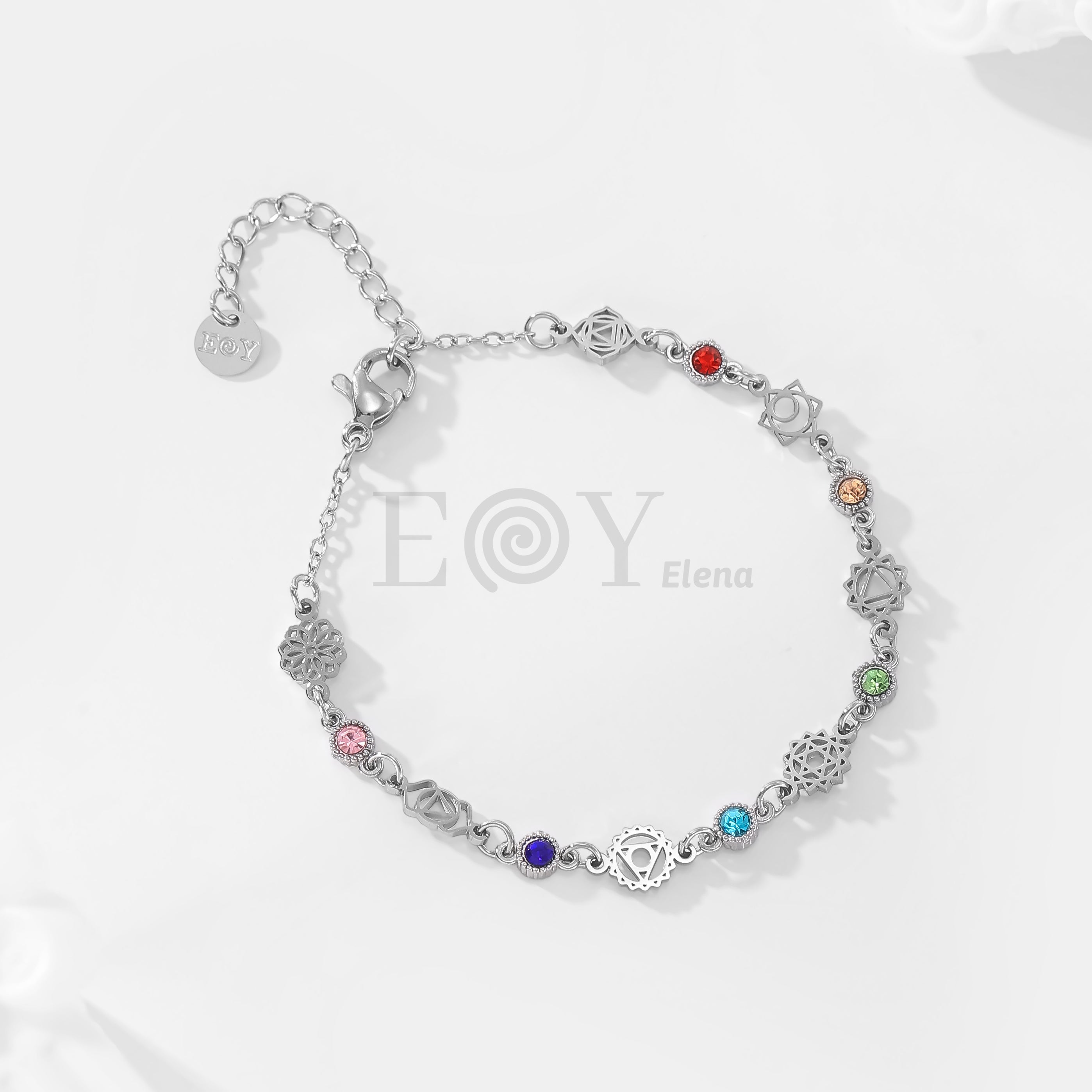 Pulsera de símbolos y circonitas colores