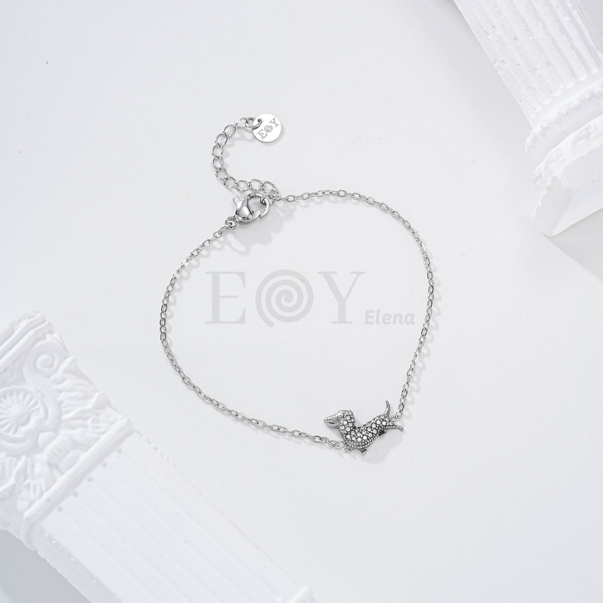Pulsera con perro salchicha circonitas acero