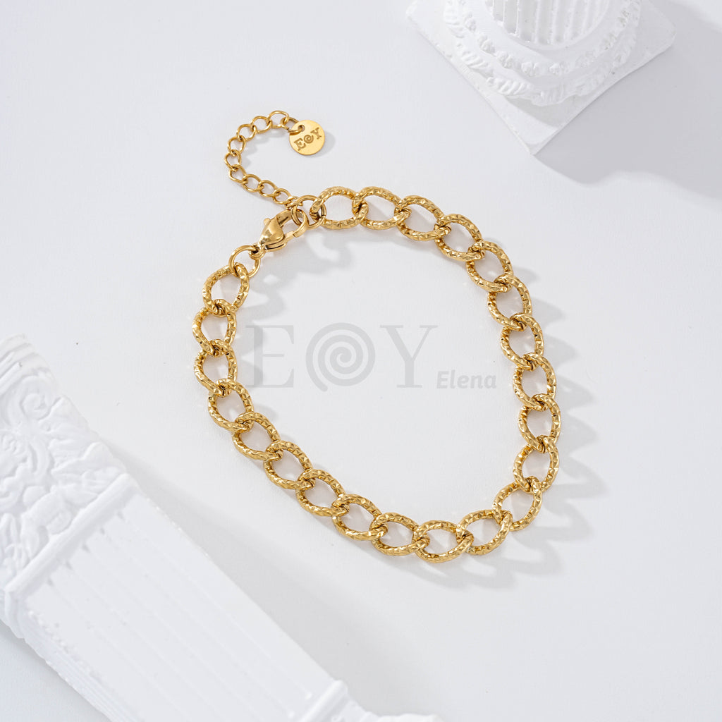 Pulsera con aros entrelazados textura acero