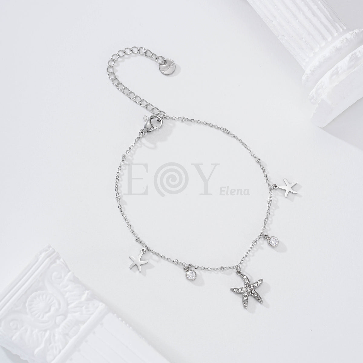 Pulsera estrella de mar y circonitas acero