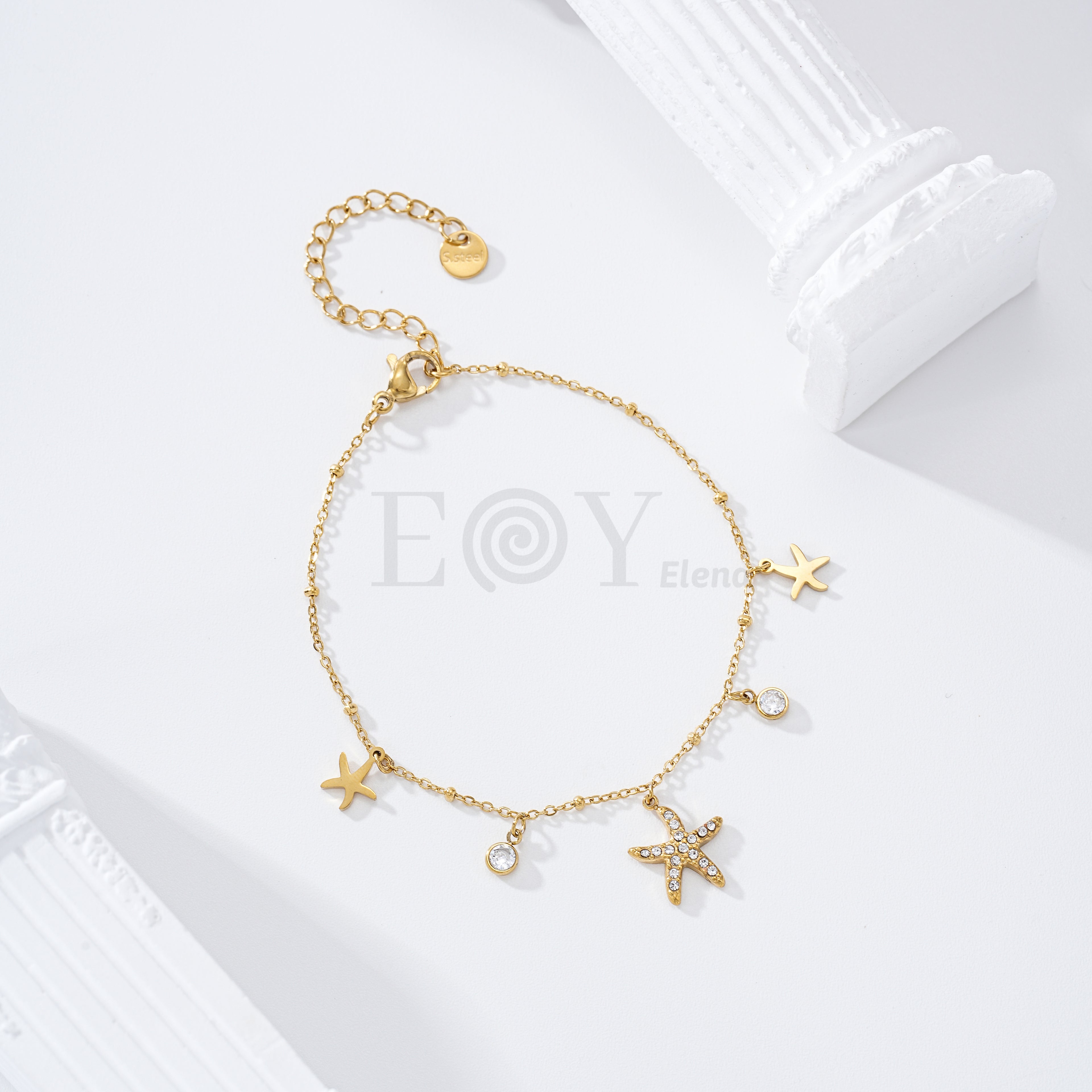 Pulsera estrella de mar y circonitas acero