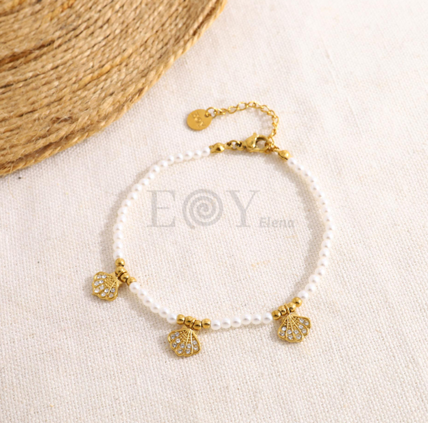 Pulsera perlas con conchas circonitas