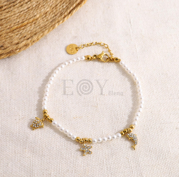 Pulsera perlas con chapas animales