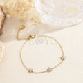 Pulsera triple estrella de mar circonitas acero