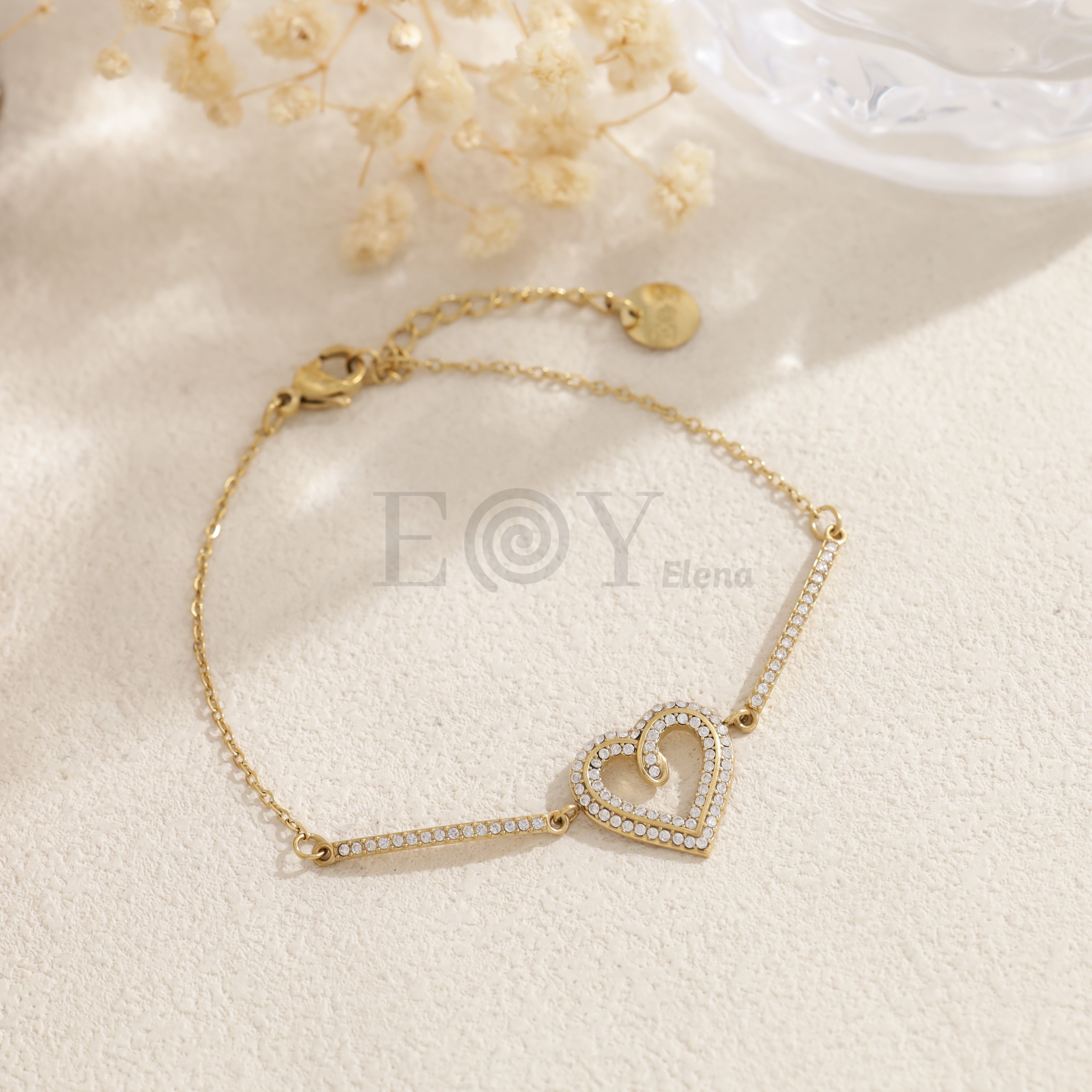 Pulsera corazón dorada con circonitas