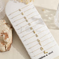 Pack de pulseras doradas con charms