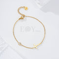 Pulsera cruz y circonita acero
