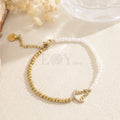 Pulsera Virgen del Rocío perlas bicolor