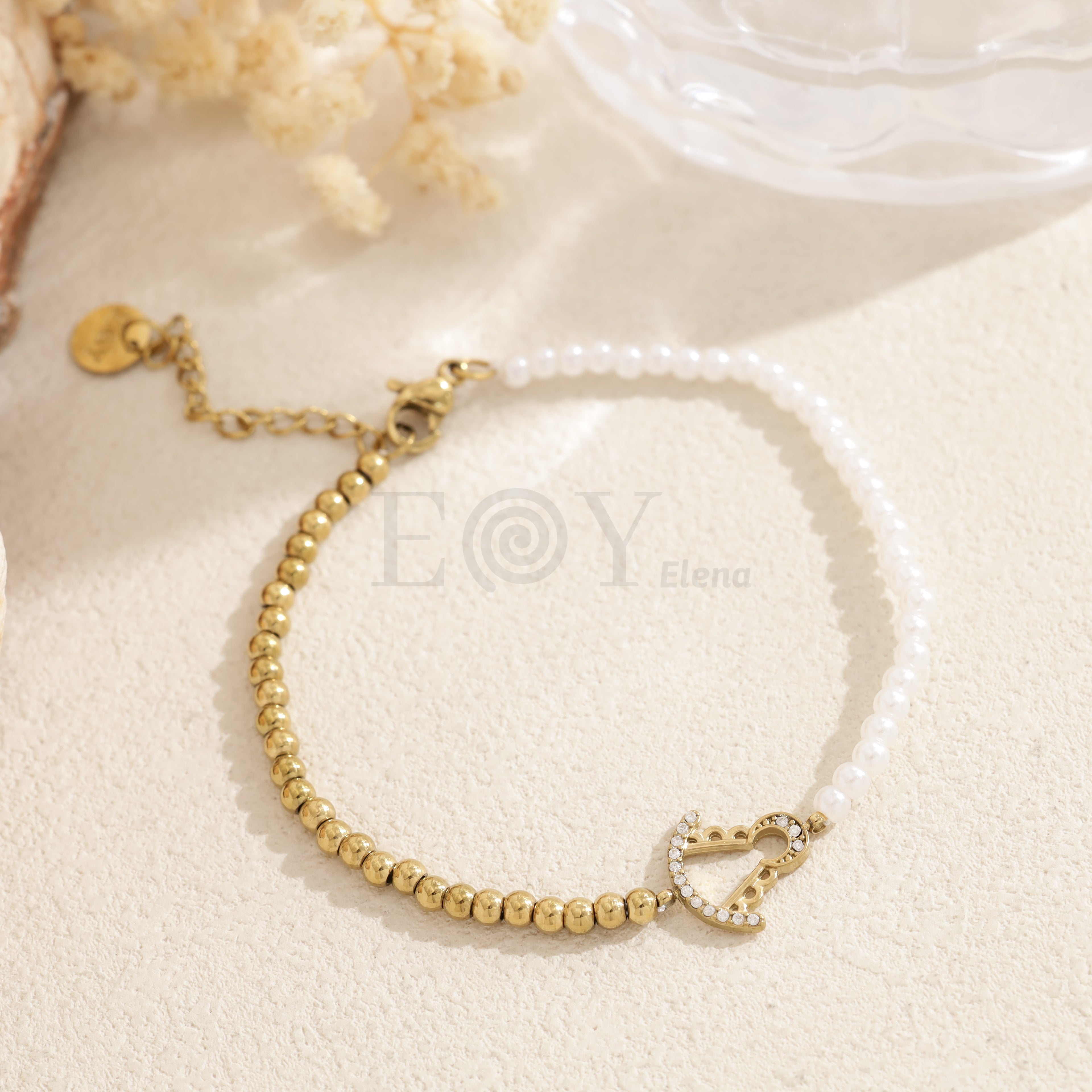 Pulsera Virgen del Rocío perlas bicolor